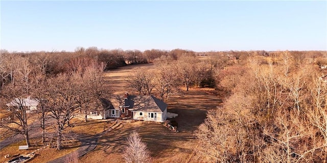 birds eye view of property with a rural view