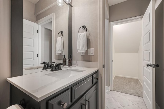 bathroom featuring tile patterned floors and vanity