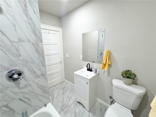 full bathroom featuring vanity, tiled shower / bath, and toilet