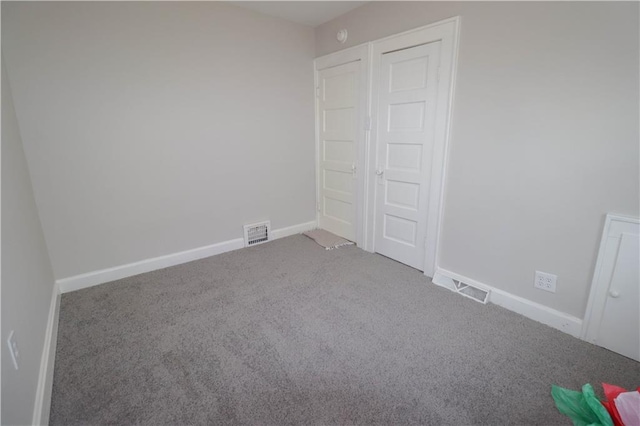 unfurnished bedroom with carpet flooring