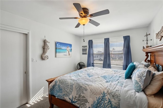 carpeted bedroom with ceiling fan