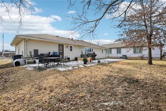 back of house with a patio area