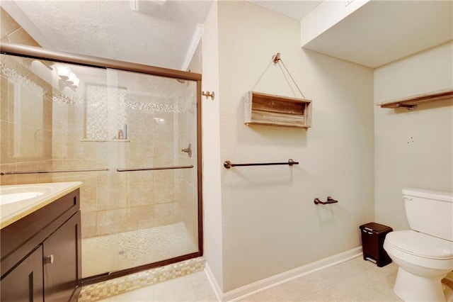 bathroom with tile patterned flooring, vanity, toilet, a shower with door, and a textured ceiling