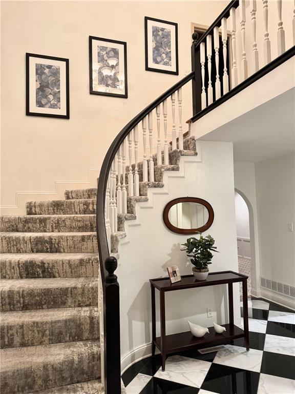 stairs with a towering ceiling