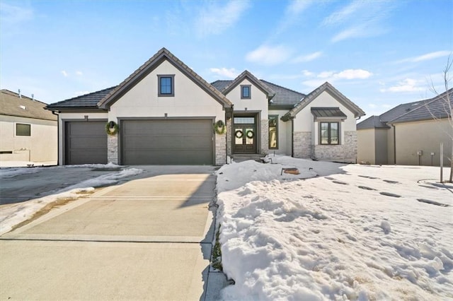 view of front of property with a garage