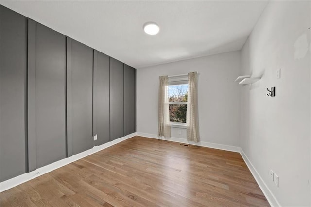 empty room featuring light hardwood / wood-style flooring