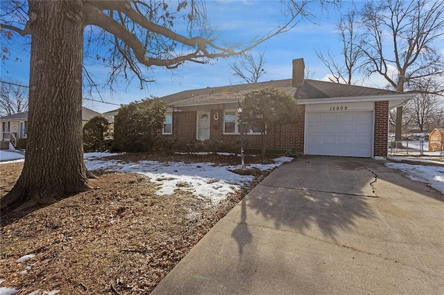 ranch-style home with a garage