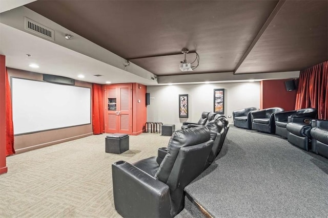 carpeted home theater with visible vents and recessed lighting