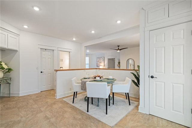 dining space featuring ceiling fan