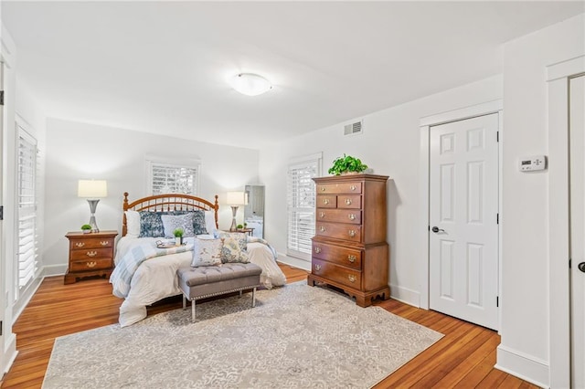 bedroom featuring hardwood / wood-style flooring