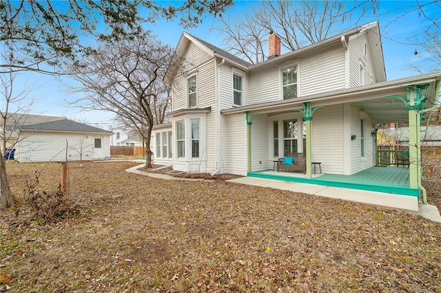 rear view of house featuring a patio area