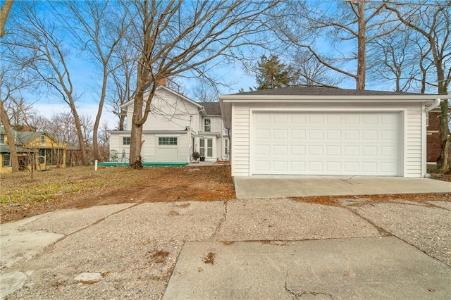 single story home featuring a garage