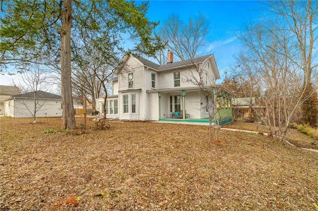 back of house featuring a patio