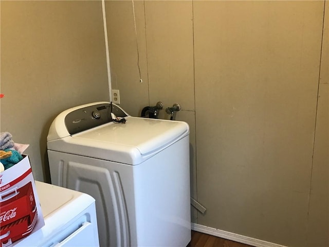 laundry area with separate washer and dryer