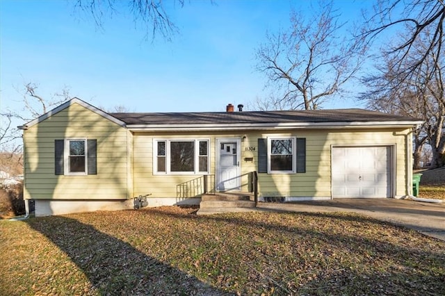 single story home featuring a garage