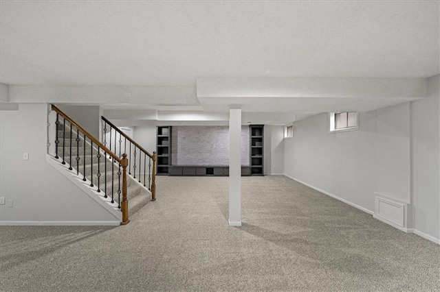 basement with carpet flooring