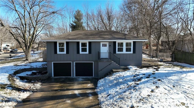 view of front of property with a garage