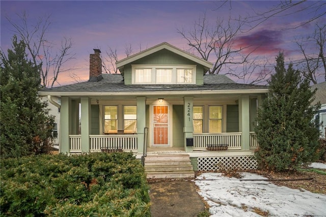 bungalow-style home with covered porch