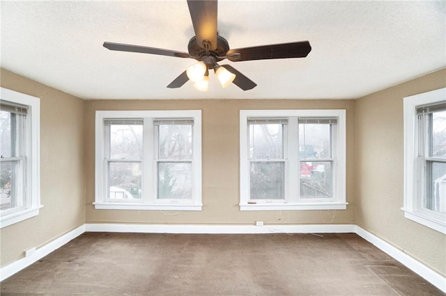 unfurnished room with carpet flooring