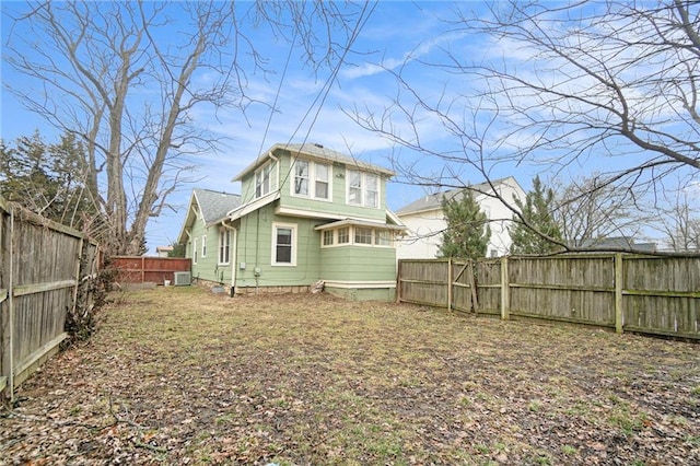 rear view of property featuring central air condition unit