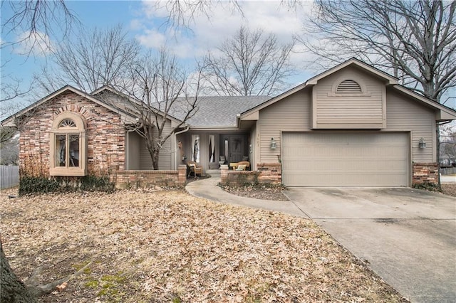 ranch-style house featuring a garage