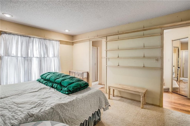 bedroom featuring a textured ceiling