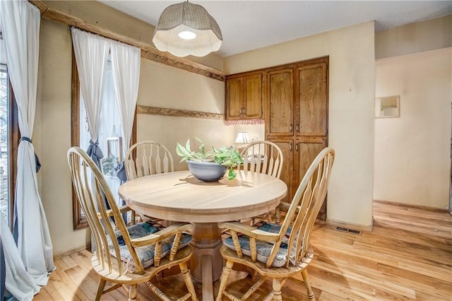 dining area featuring light hardwood / wood-style flooring