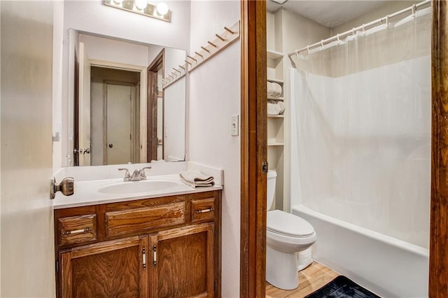 full bathroom featuring hardwood / wood-style flooring, vanity, shower / bathtub combination with curtain, and toilet