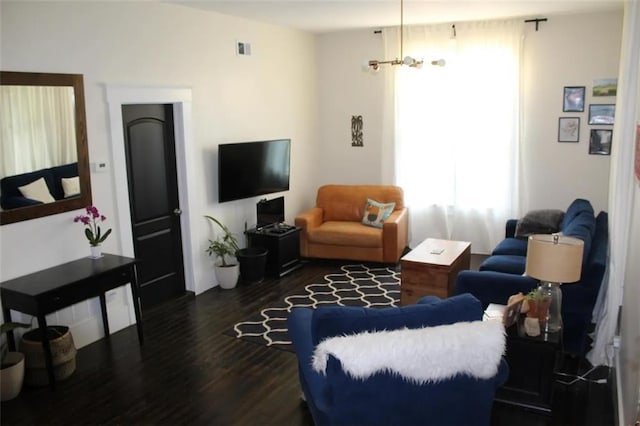 living room featuring dark wood-type flooring