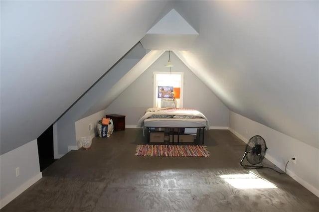 bedroom with lofted ceiling