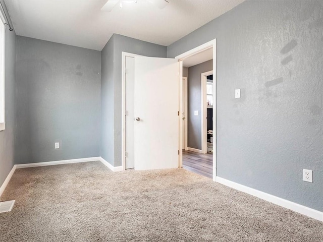 view of carpeted spare room