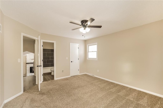 unfurnished bedroom with carpet and ceiling fan