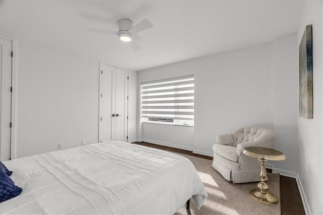 bedroom featuring wood-type flooring and ceiling fan