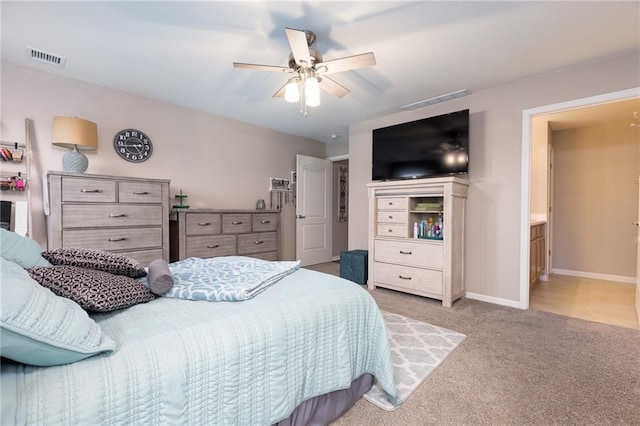 bedroom featuring ceiling fan and light colored carpet