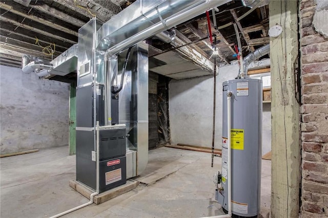 utility room with water heater and heating unit