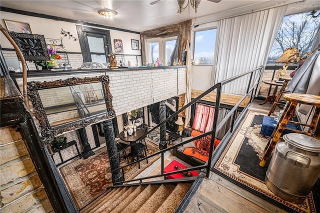 interior space featuring ceiling fan