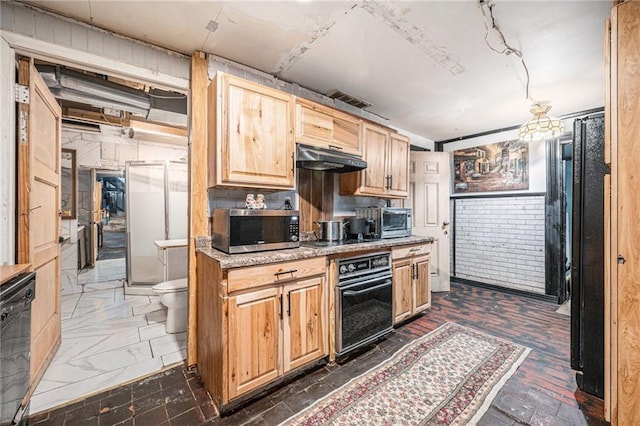 kitchen with black appliances