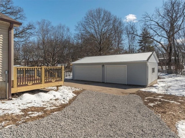 view of snow covered garage