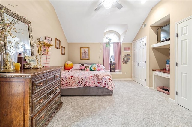 bedroom with lofted ceiling, light carpet, and ceiling fan