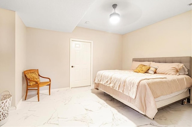 bedroom featuring ceiling fan