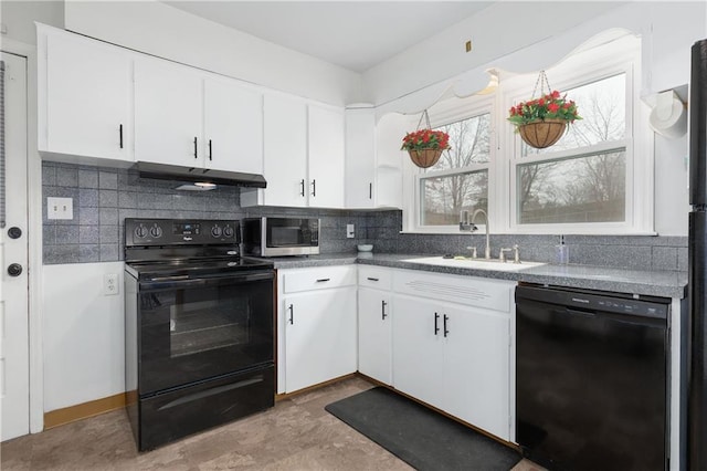 kitchen featuring backsplash, white cabinetry, a sink, under cabinet range hood, and black appliances