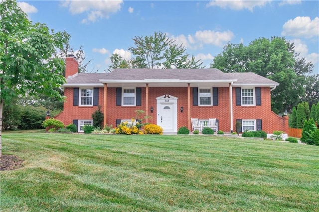 view of front of house with a front lawn