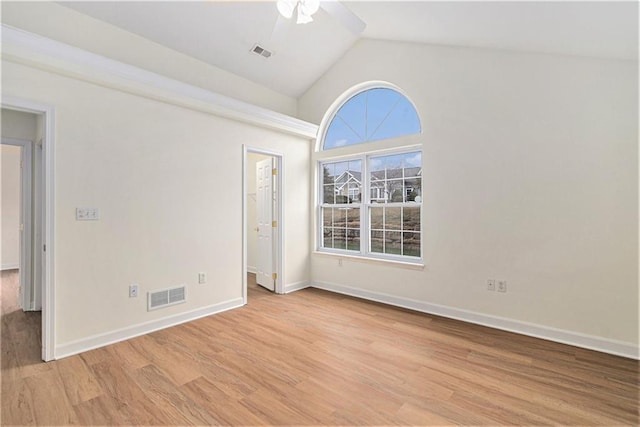 unfurnished room featuring vaulted ceiling, ceiling fan, and light hardwood / wood-style flooring