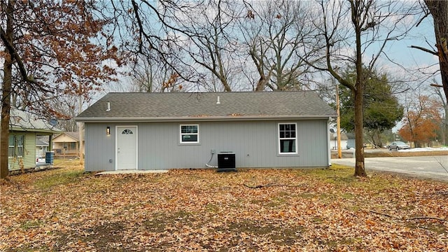 back of property featuring cooling unit