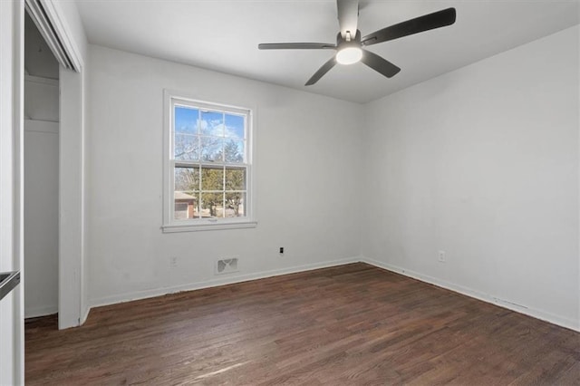7901 Hedges Ave, Raytown, MO 64138 - unfurnished bedroom featuring visible vents, a ceiling fan, wood finished floors, a closet, and baseboards
