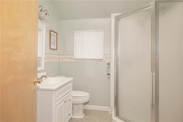 full bath featuring toilet, a stall shower, baseboards, and vanity