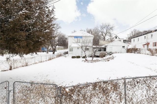 view of front facade with a garage and fence