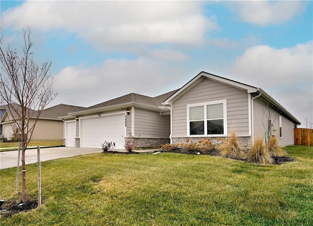 ranch-style house featuring a garage and a front yard