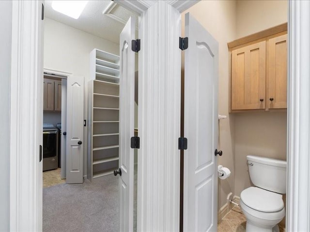 bathroom featuring toilet