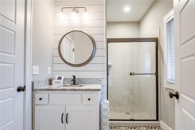 bathroom with vanity and an enclosed shower